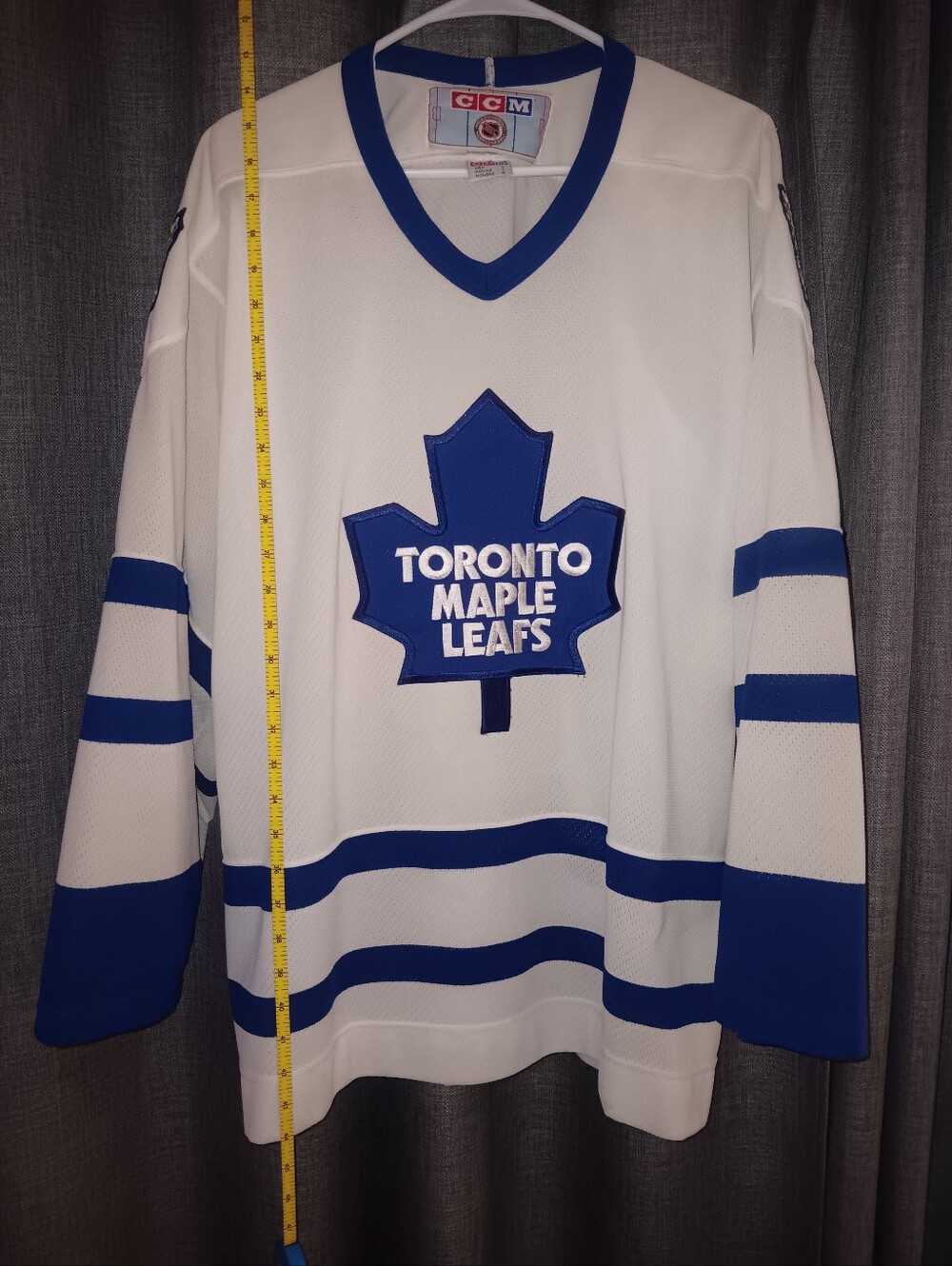 CCM White V-Neck Hockey Sweater with Blue Maple Leaf Crest